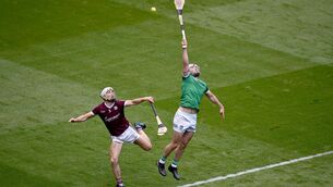 <p>FULL STRETCH: Aaron Gillane of Limerick in action against Daithí Burke of Galway during last year's All-Ireland SHC semi-final at Croke Park. Pic: Daire Brennan/Sportsfile</p>