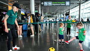 <p>HIGH HOPS: Denise O'Sullivan with supporter Doireann Mulvaney, age 3 at Dublin Airport ahead of the Republic of Ireland's flight to Australia. Picture:  Stephen McCarthy/Sportsfile</p>