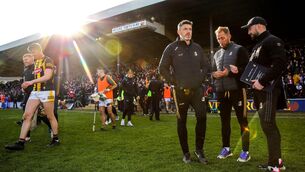 <p>RAYS OF PROGRESS: Kilkenny manager Derek Lyng chats with his backroom team. Pic: INPHO/Ryan Byrne</p>