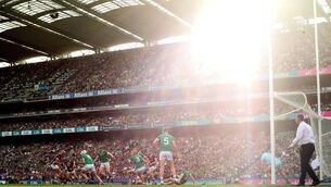 <p>Limerick’s William O'Donoghue and Kyle Hayes with Conor Whelan of Galway </p>