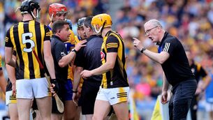 <p>NOT HAPPY: Referee Colm Lyons and Clare manager Brian Lohan. Pic: INPHO/Bryan Keane</p>