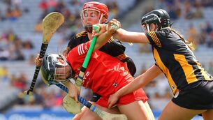 <p>DRIVING ON: Cork's Amy O’Connor is tackled by Tiffanie Fitzgerald and Kellyann Doyle of Kilkenny. Pic: INPHO/Bryan Keane</p>