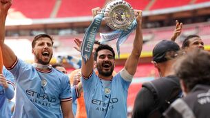<p>HEARTBEAT: Ilkay Gundogan lifts the FA Cup. Pic: PA</p>