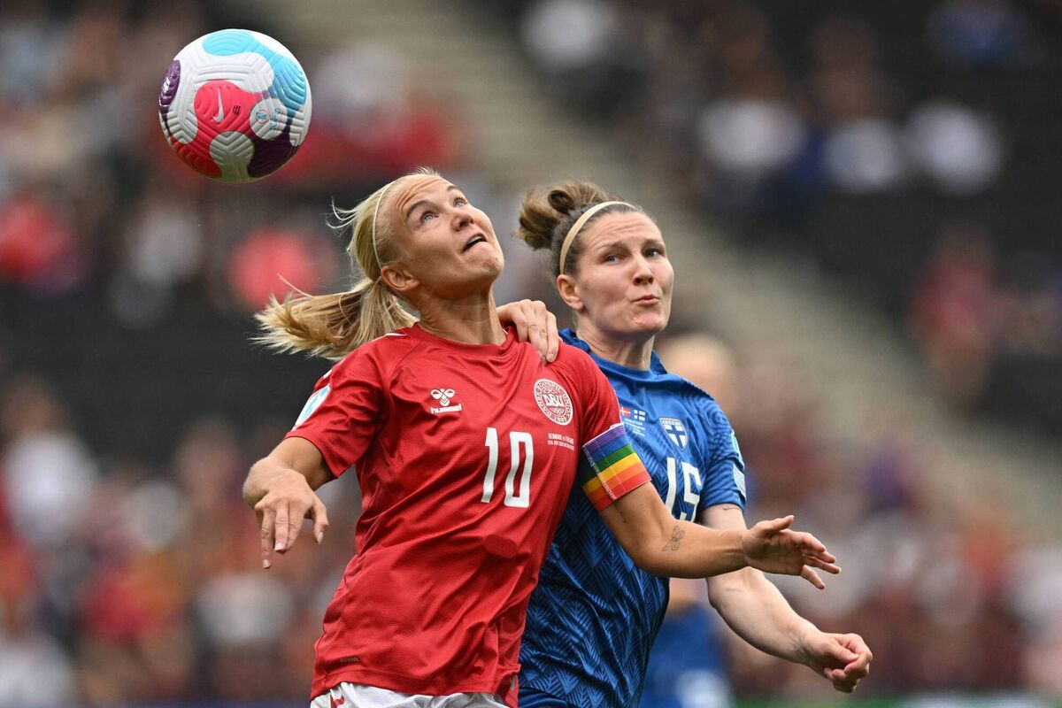 KEY ROLE: Denmark's striker Pernille Harder (L) heads the ball during Euro 2022. Pic: Justin Tallis/AFP via Getty Images