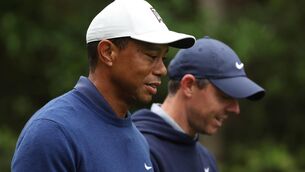 <p>PROBE DETAILS: Tiger Woods of the United States and Rory McIlroy of Northern Ireland. Pic: Christian Petersen/Getty Images</p>