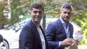 <p>FRESH START: United States soccer player Christian Pulisic, front, smiles as he arrives in Milan for medical tests at Italian Serie A soccer team AC Milan before an expected transfer from British club FC Chelsea. Pic: Stefano Porta/LaPresse via AP</p>
