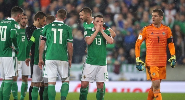 Evans apologises over wife’s foul-mouthed ref rant