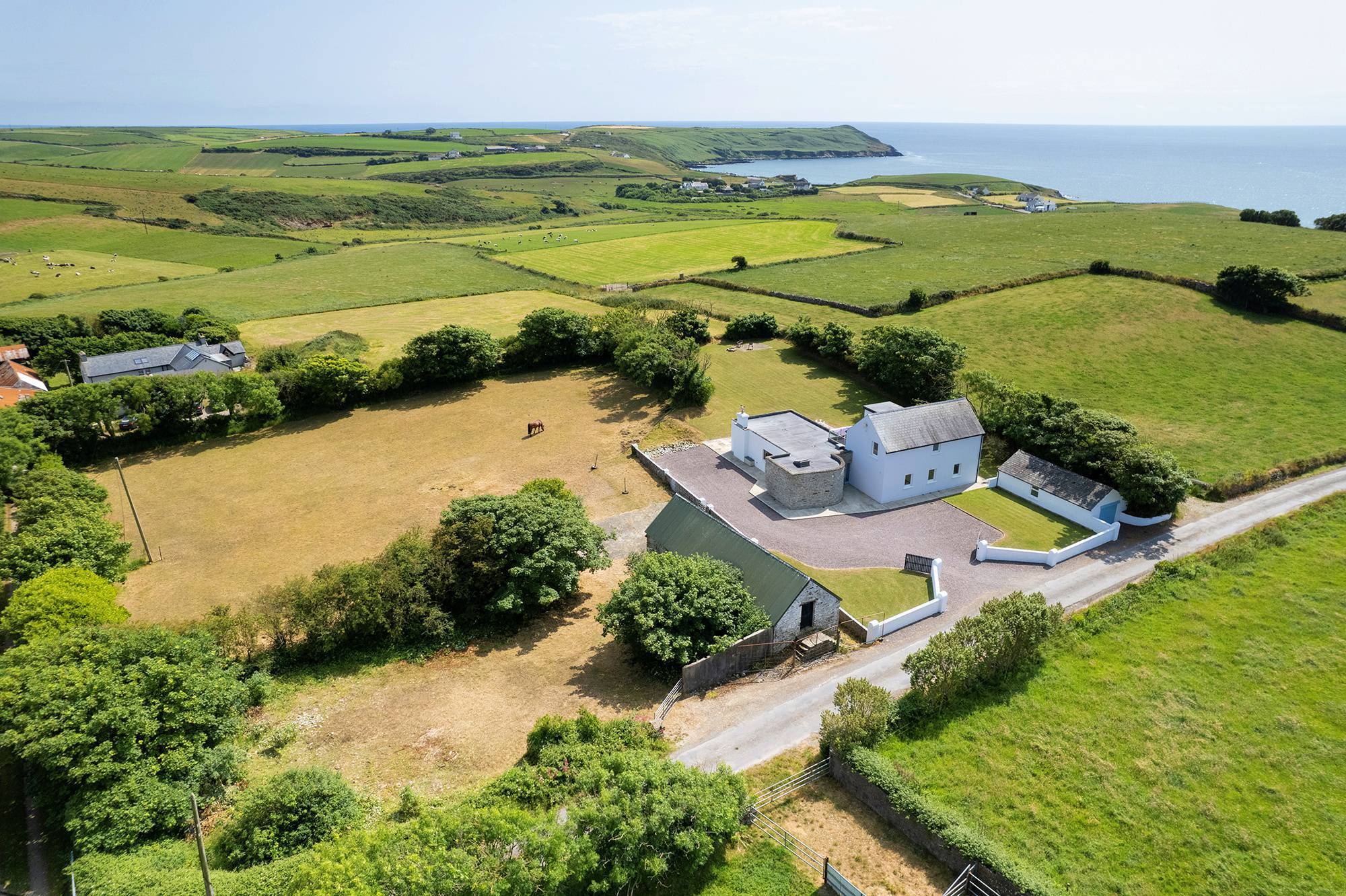 Not too much of a stretch to the sea at Cois Farraige,  Lissycremin near Butlerstown, Moloney's Strand and Dunworley beach. Agent Con O'Neill guides at €645,000