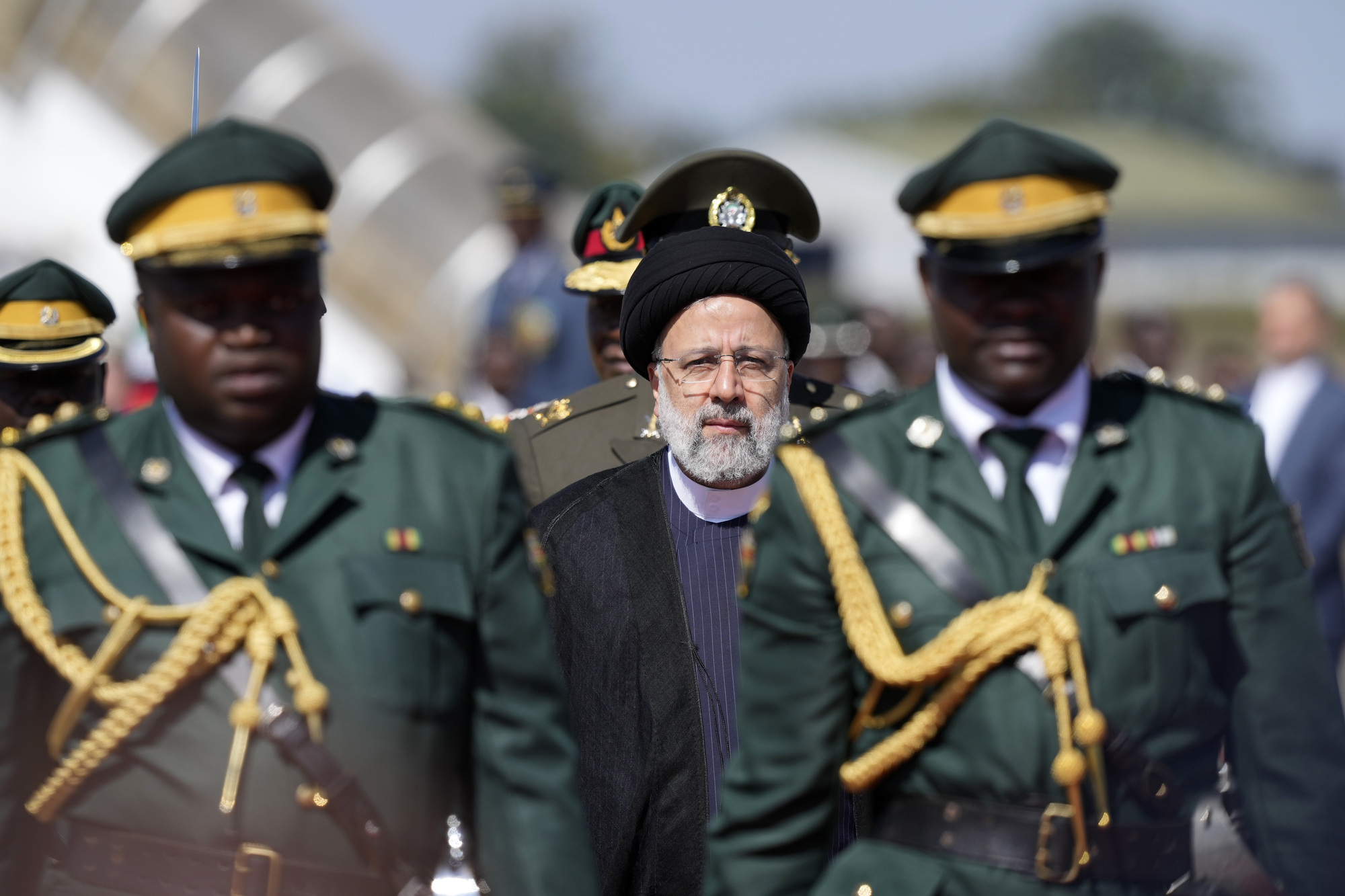 Iranian president welcomed in Zimbabwe with anti-West songs