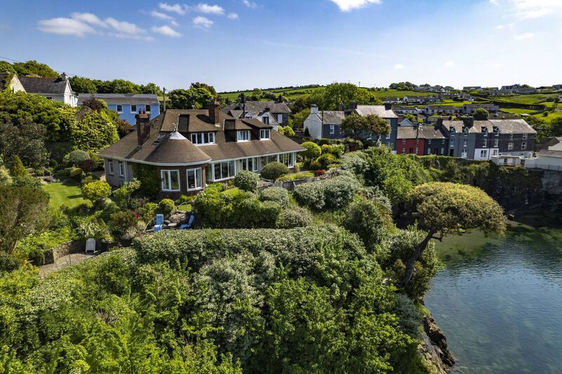 Cove Cottage is off the road from Ardbrack into Summercove, in a prized position