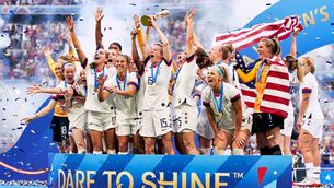 <p>TEAM TO BEAT: USA's Megan Rapinoe and team-mates celebrate with the FIFA Women's World Cup Trophy in 2019.</p>