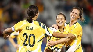 <p>HOME COMFORTS: Katrina Gorry of the Matildas celebrates with her teammates Sam Kerr and Elise Kellond-Knight. Pic: Mark Kolbe/Getty Images</p>