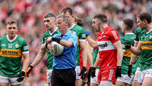 <p>MAN IN THE MIDDLE: Referee Joe McQuillan during Sunday's Kerry-Derry clash.  Picture: INPHO/Ben Brady</p>