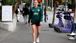 <p>BOOT OFF: Denise O'Sullivan takes a walk near the team Emporium Hotel, Brisbane, Australia on Monday</p>