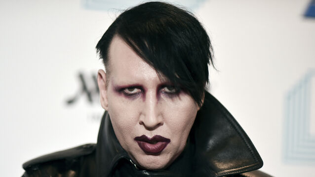 Marilyn Manson is accused of spitting and blowing his nose on a videographer at a 2019 concert (Photo by Richard Shotwell/Invision/AP, File)