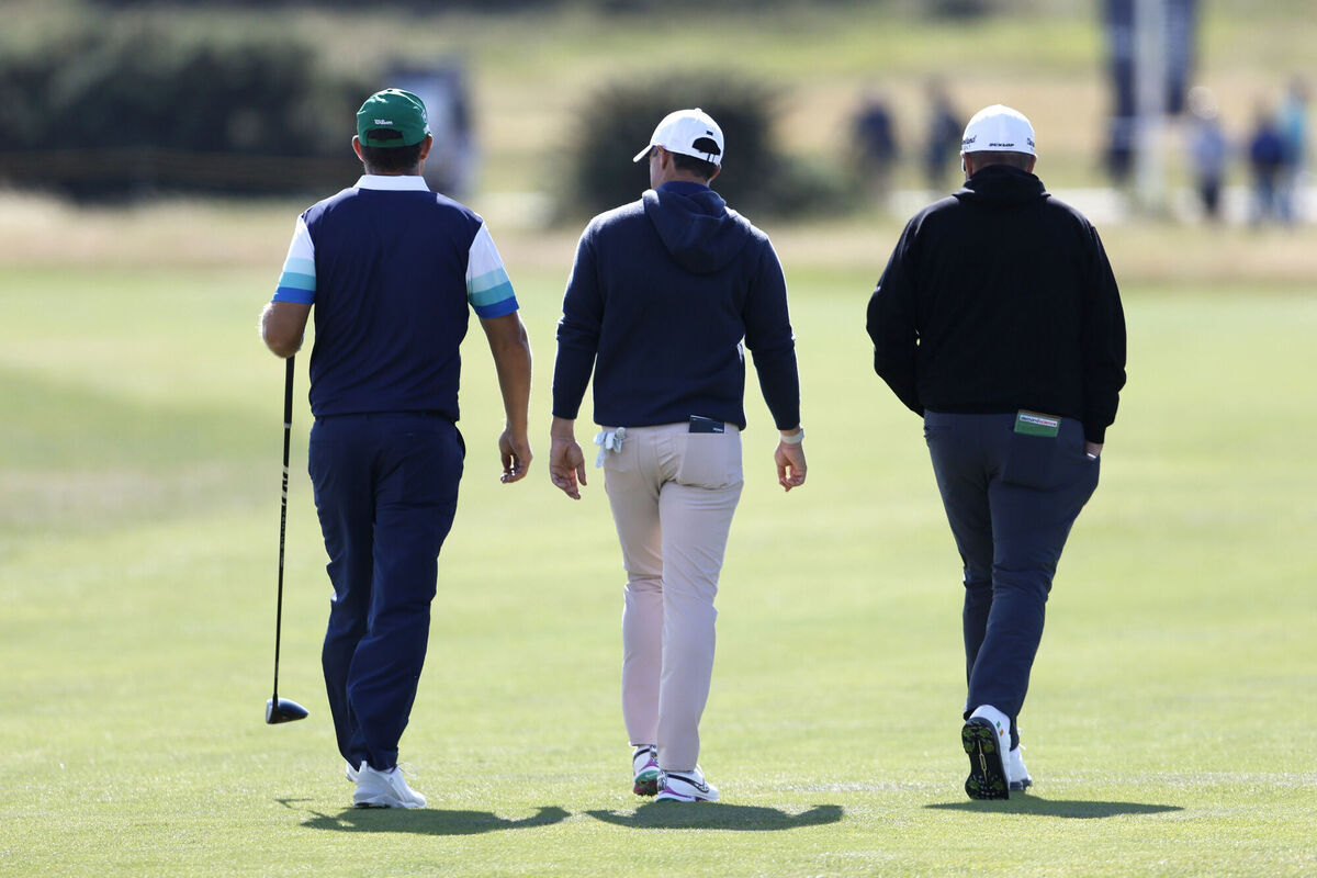Rory McIlroy, Padraig Harrington and Shane Lowry on the 5th tee during a practice round ahead of The Open at the Royal Liverpool.