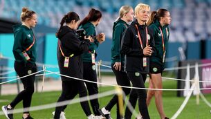 <p>NO TIME TO TRIP UP: Vera Pauw and her Republic of Ireland WNT walk through Sydney's Stadium Australia on the eve of their World Cup opener. Pic:  INPHO/Ryan Byrne</p>