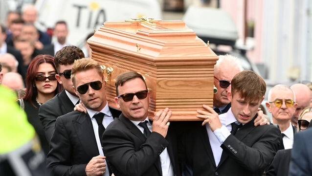 <p>Ronan Keating (centre middle left) helps carry the coffin of his brother Ciaran Keating towards St Patrick’s Church in Louisburgh, Co Mayo, for his funeral. The older brother of Ronan Keating died in a two-car crash near Swinford in Co Mayo (Oliver McVeigh/PA)</p>