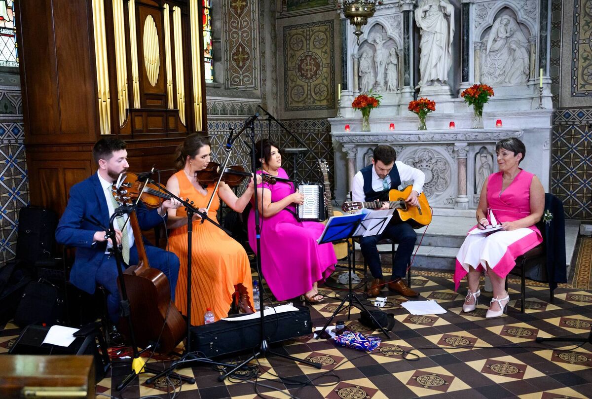 Friends and family performed in the church. Friends and family performed in the church.