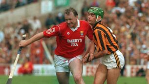 <p>Teddy McCarthy of Cork takes on Kilkenny's Bill Hennessy of Kilkenny in the 1992 Liam McCarthy Cup clash. Cork's dual star is remembered Sunday night on TG4. Pic: INPHO</p>
