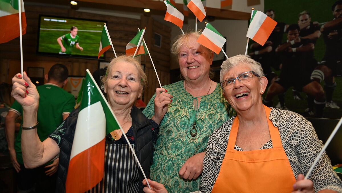 TRUE COLOURS: Patsy McCarthy, Caitriona Twomey and Olive Morris of Cork Penny Dinners watching the game at the Woolshed Bar &amp; Grill Cork. Family and friends of Denise O'Sullivan gathered to watch the FIFA Women's Worlc Cup game Ireland vs Australia at The Woolshed Bar &amp; Grill on Thursday morning. Pic: Larry Cummins