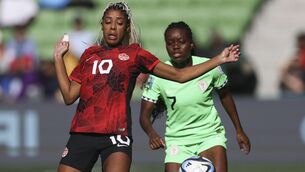 <p>Canada's Ashley Lawrence, left, and Nigeria's Antionette Payne battle for the ball during the Women's World Cup Group B soccer match between Nigeria and Canada in Melbourne, Australia, Friday, July 21, 2023. (AP Photo/Hamish Blair)</p>