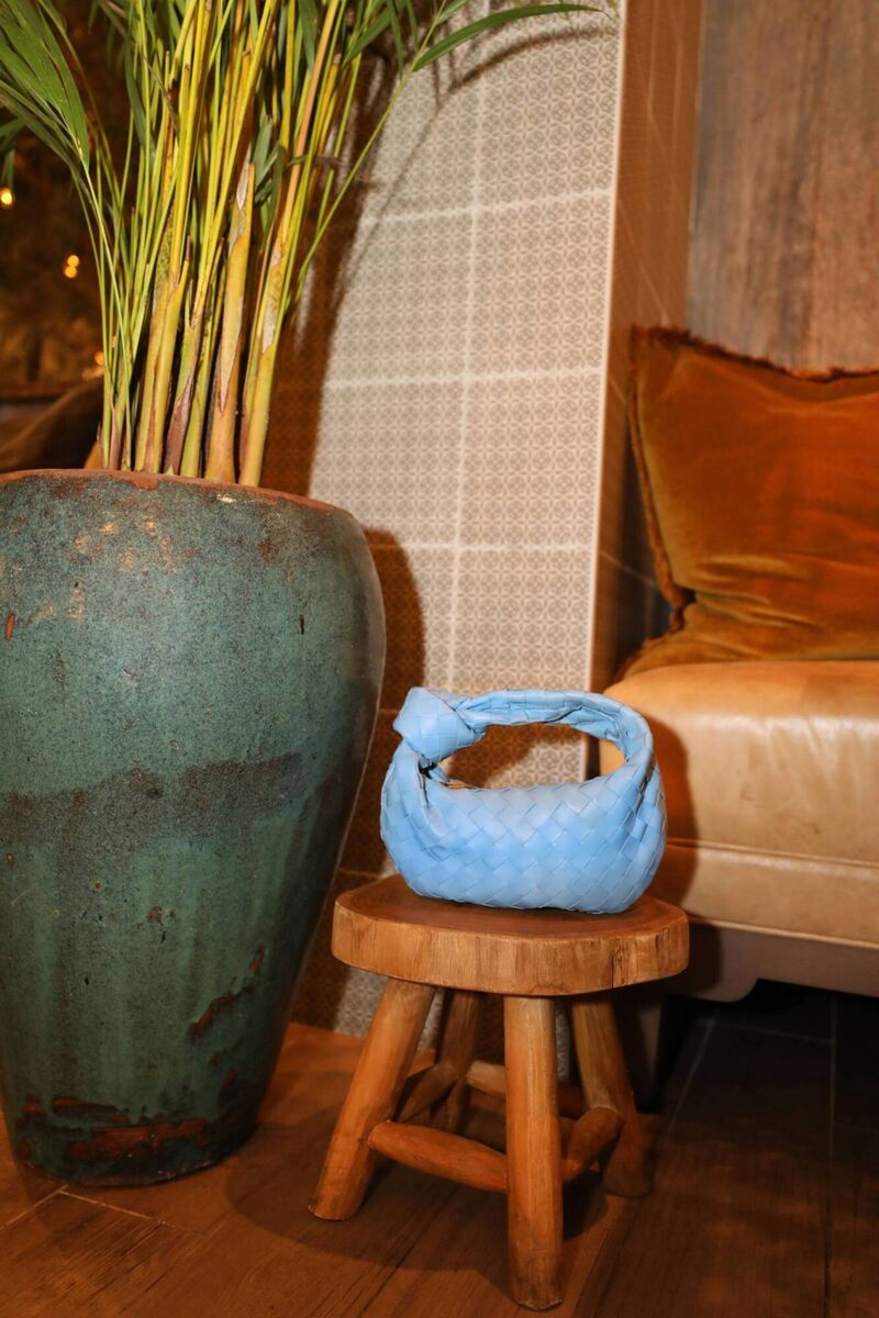 Aba restaurant in Bal Harbour, Florida, stocks wooden stools for purses. Picture: Amanda Saviñón/Bloomberg Aba restaurant in Bal Harbour, Florida, stocks wooden stools for purses. Picture: Amanda Saviñón/Bloomberg