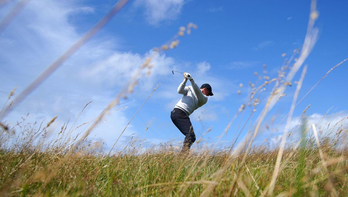 McIlroy plays from the 14th fairway during day two of The Open. Photo credit: Peter Byrne/PA Wire.