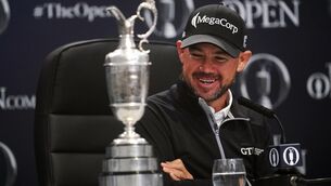 <p>LOOK OF LOVE: Brian Harman with the Claret Jug during a press conference after winning The Open at Royal Liverpool, Wirral. Pic: David Davies/PA Wire</p>