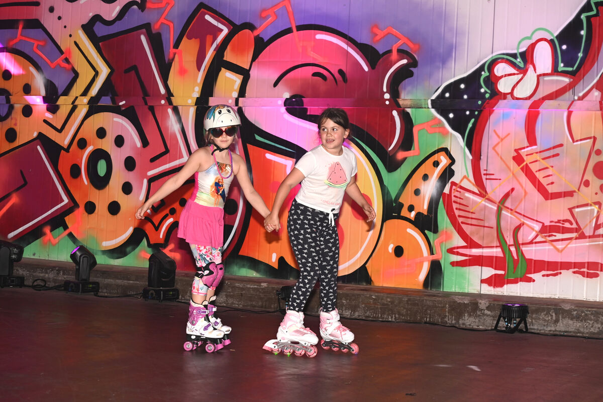  Friends Elodie and Amelia having fun at the Marina Market Barbie Roller Disco. Picture: Larry Cummins