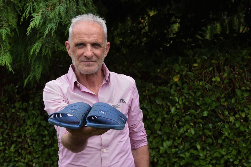 Bernard Phelan, a dual-citizen of both Ireland and France and originally from Clonmel in Tipperary, holding the shoes that he wore when he was detained in Iran for more than six months on spying charges. "That’s all I have left from the Iranian prison." Photo: Moya Nolan Bernard Phelan, a dual-citizen of both Ireland and France and originally from Clonmel in Tipperary, holding the shoes that he wore when he was detained in Iran for more than six months on spying charges. "That’s all I have left from the Iranian prison." Photo: Moya Nolan