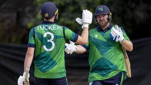 <p>JOB DONE: Paul Stirling of Ireland celebrates with Lorcan Tucker of Ireland at the end of the game. Pic: ICC</p>
