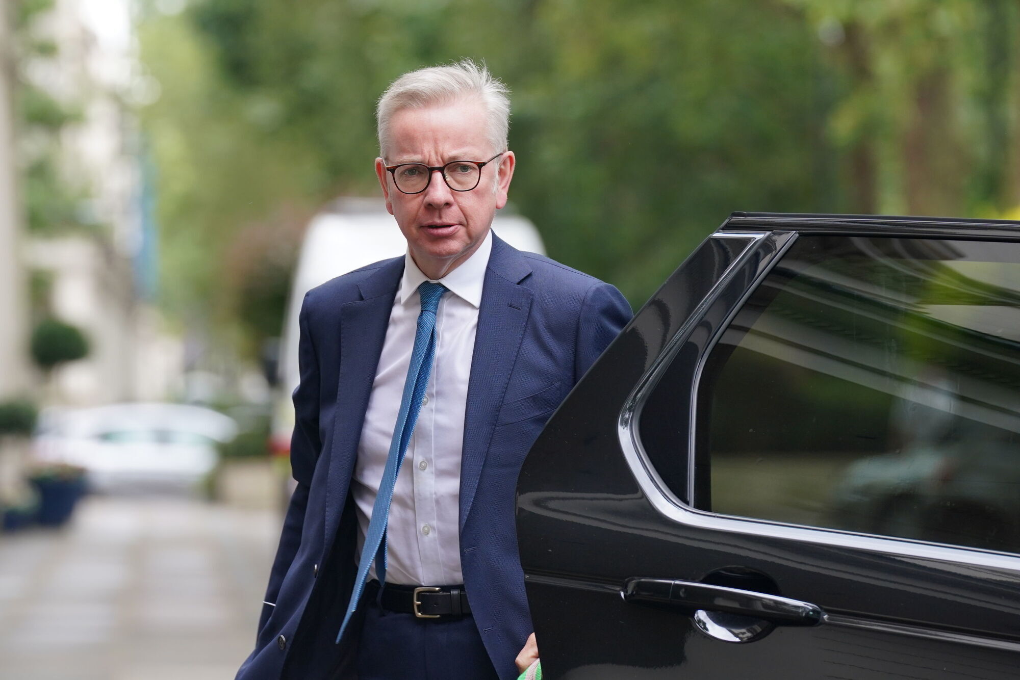 British government vows to stick to petrol car sales ban to calm investors