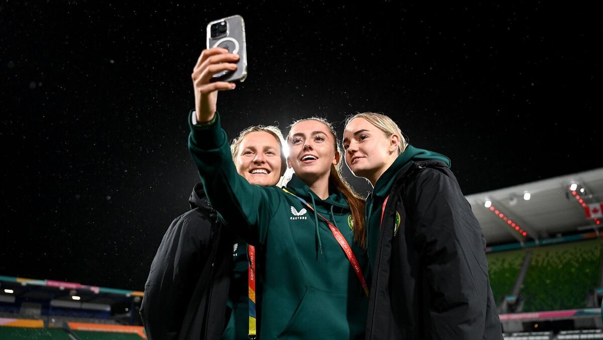 MAKING MEMORIES: Players, from left, Kyra Carusa, Abbie Larkin and Izzy Atkinson during a Republic of Ireland stadium familiarisation at Perth Rectangular Stadium in Perth, Australia, ahead of their second Group B match of the FIFA Women's World Cup 2023, against Canada. Photo by Stephen McCarthy/Sportsfile