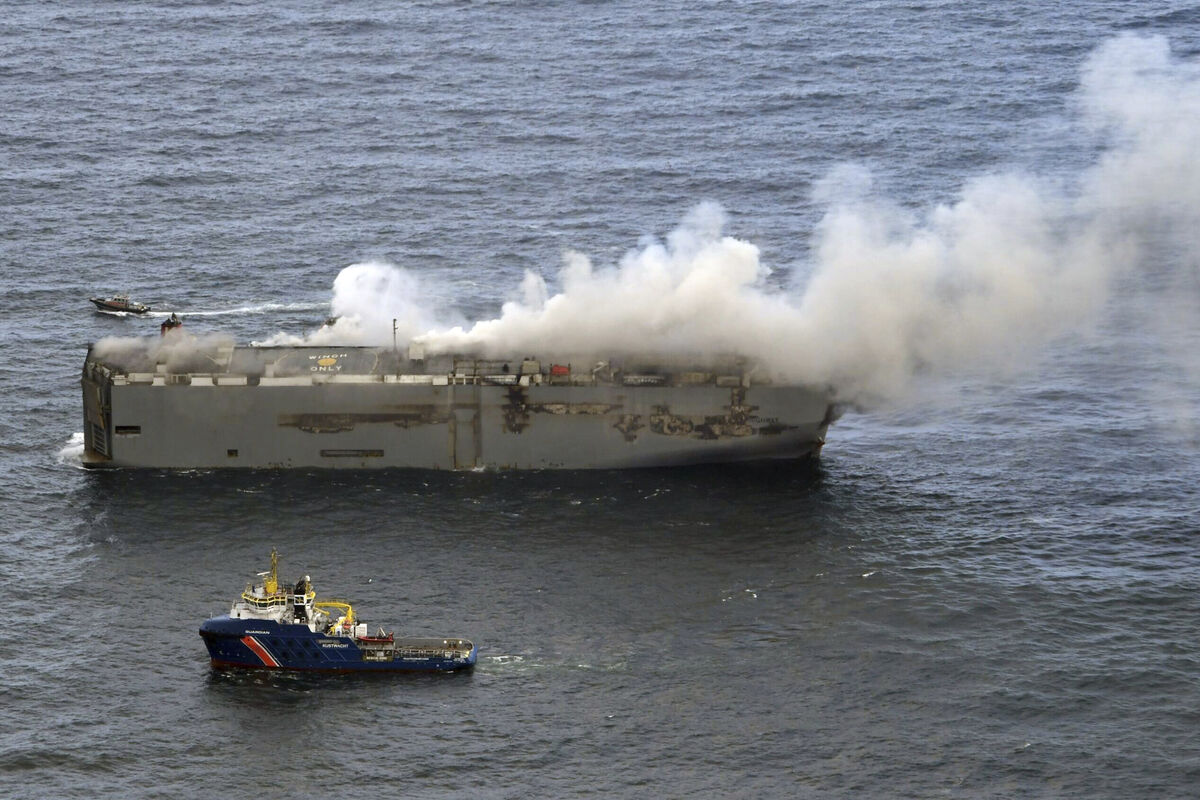 Smoke and flames are seen on a freight ship in the North Sea, about 27 kilometers north of the Dutch island of Ameland, Wednesday, July 26, 2023. (Kustwacht Nederland/Coastguard Netherlands via AP) Smoke and flames are seen on a freight ship in the North Sea, about 27 kilometers north of the Dutch island of Ameland, Wednesday, July 26, 2023. (Kustwacht Nederland/Coastguard Netherlands via AP)