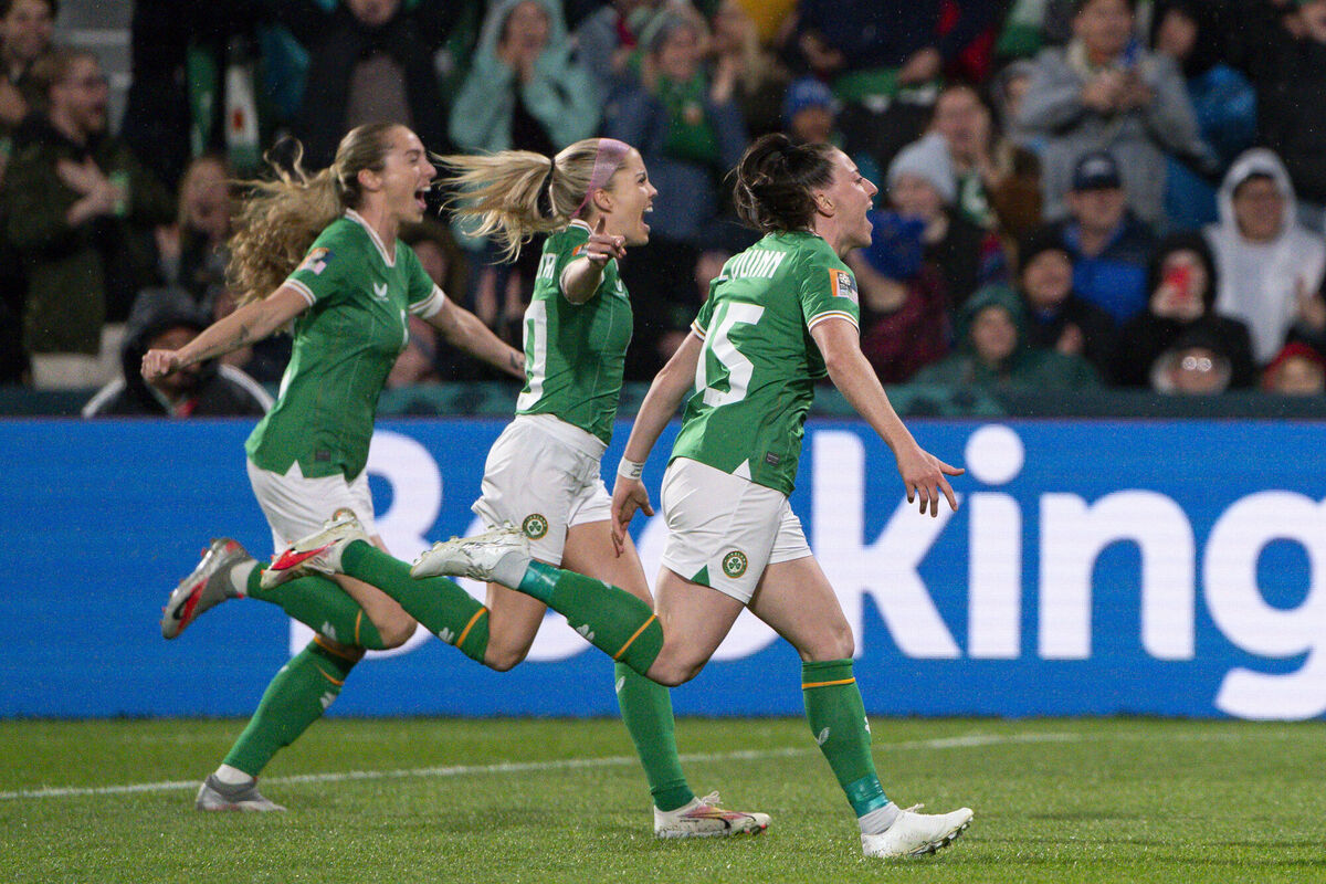 Republic of Ireland players celebrate after Katie McCabe scores their first goal.