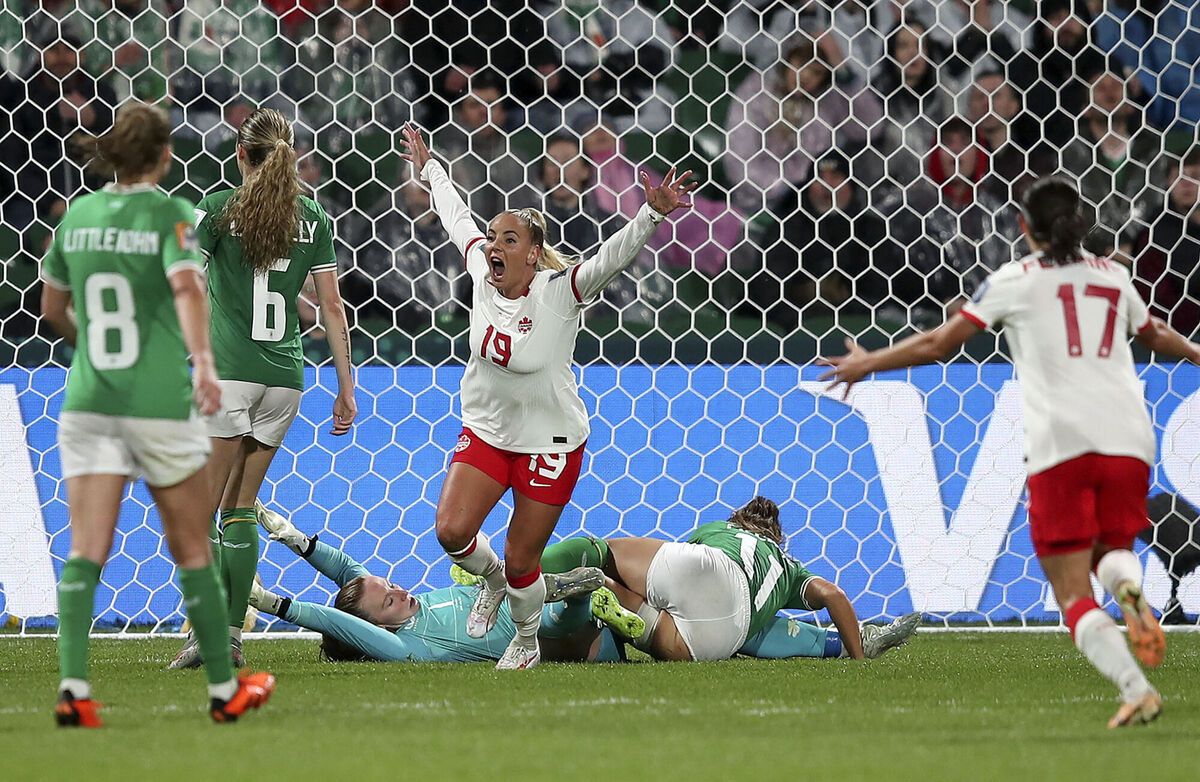 Canada's Adriana Leon, centre, celebrates after scoring her side's second goal.