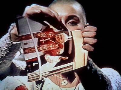 Sinéad O'Connor ripping up a photo of Pope John Paul II in 1992. Sinéad O'Connor ripping up a photo of Pope John Paul II in 1992.