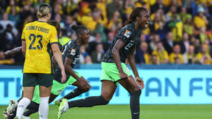 <p>STUNNER: Nigeria's Ifeoma Onumonu, right, celebrates after teammate Uchenna Kanu, background, scored their side's first goal. Pic: AP Photo/Tertius Pickard</p>