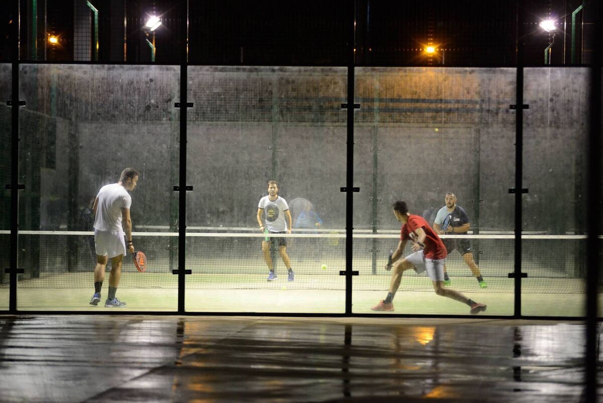 Young people playing Padel in outdoor facilities in Spain