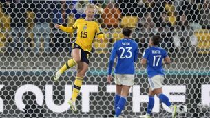 <p>JUMPING FOR JOY: Sweden's Rebecka Blomqvist, left, celebrates after scoring her side's 5th goal during the World Cup Group G match in Wellington, New Zealand. Pic: AP Photo/John Cowpland</p>