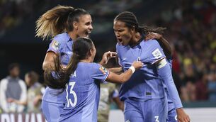 <p>WINNING GOAL: France's Wendie Renard, right, celebrates with teammates after scoring her team's second goal during the World Cup Group F match in Brisbane, Australia. Pic: AP Photo/Aisha Schulz</p>