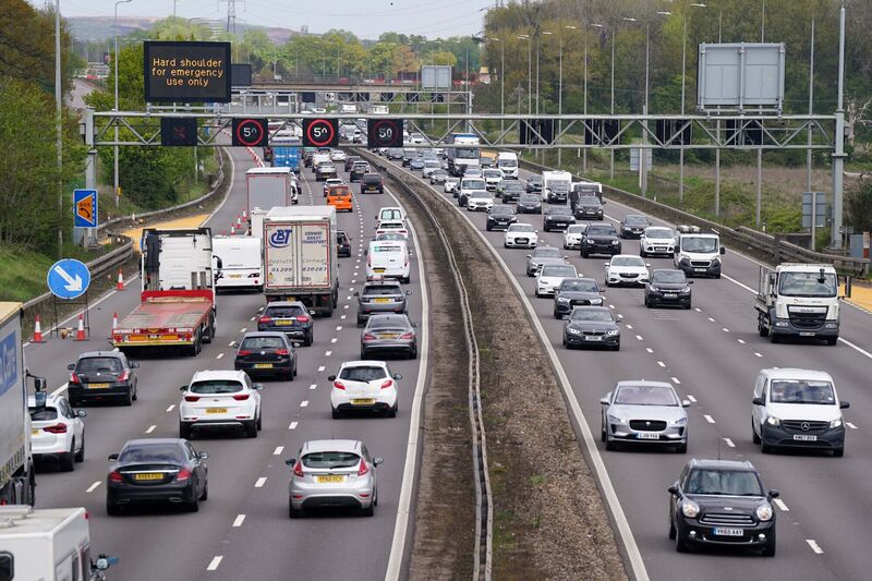 Slow-moving traffic on the M42 south of Birmingham. The city introduced a charge to enter its clean air zone using automatic number plate recognition in 2021.