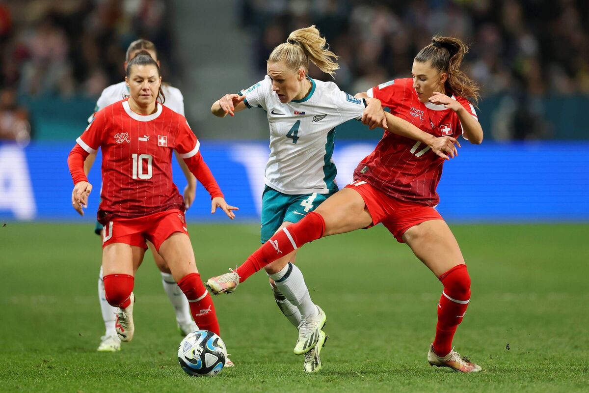 C.J. Bott of New Zealand competes for the ball against Ramona Bachmann and Seraina Piubel of Switzerland during the FIFA Women's World Cup Australia &amp; New Zealand 2023 Group A match between Switzerland and New Zealand at Dunedin Stadium on July 30, 2023 in Dunedin, New Zealand. (Photo by Lars Baron/Getty Images)