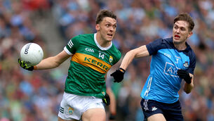 <p>David Clifford of Kerry and Michael Fitzsimons of Dublin. Pic: James Crosbie</p>