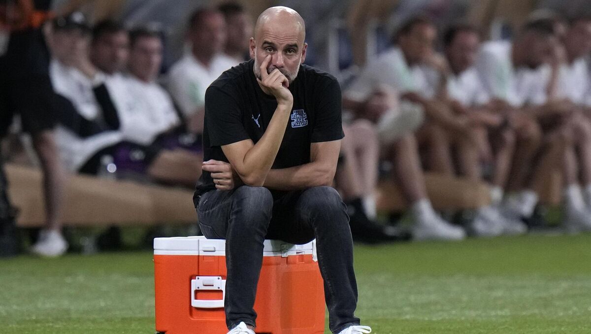 Manchester City manager Pep Guardiola looks on during a friendly soccer match against Bayern at the National Stadium in Tokyo, Japan, Wednesday, July 26, 2023.(AP Photo/Shuji Kajiyama) Manchester City manager Pep Guardiola looks on during a friendly soccer match against Bayern at the National Stadium in Tokyo, Japan, Wednesday, July 26, 2023.(AP Photo/Shuji Kajiyama)
