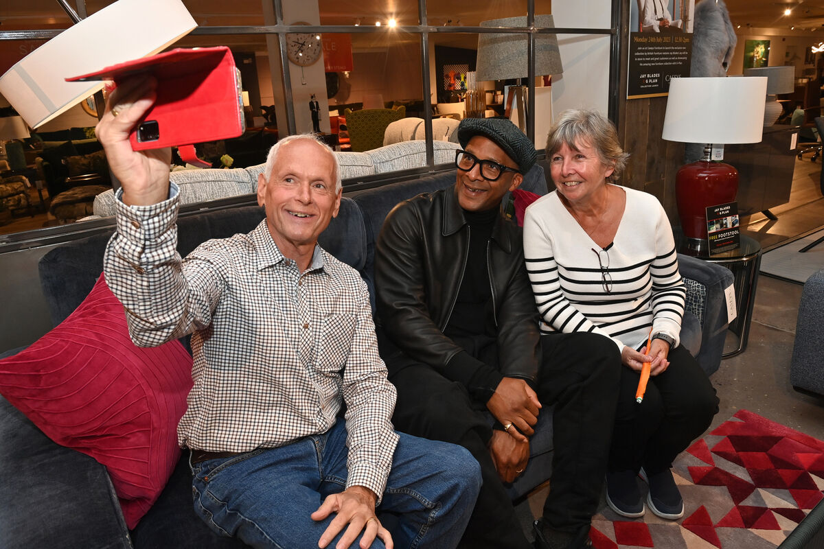 TV presenter and furniture restorer Jay Blades with Australian fans Ken and Shirley Watts. 