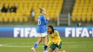 <p>CONTRASTING EMOTIONS: South Africa's Linda Motlhalo celebrates as Italy's Giada Greggi walks past. Pic: AP Photo/Alessandra Tarantino</p>