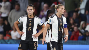 <p>SEISMIC SHOCK: Germany's Alexandra Popp, right, and teammate Lena Oberdorf react to their exit. Pic: AP Photo/Tertius Pickard</p>