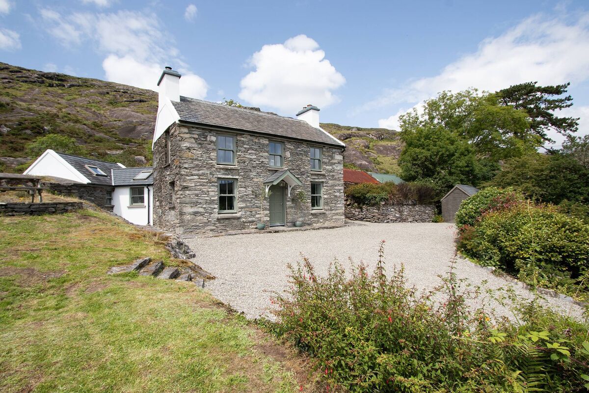 Old cow shed to the side was linked to main house by a previous owner Old cow shed to the side was linked to main house by a previous owner